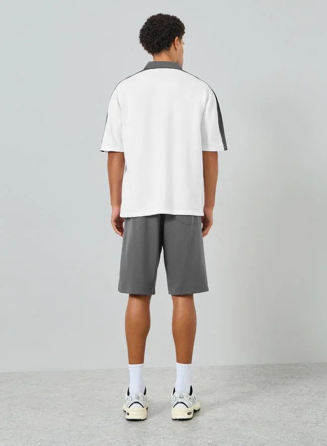 Styli  Men White Oversized Polo and Shorts Co-Ords for Men | Best Price UAE
